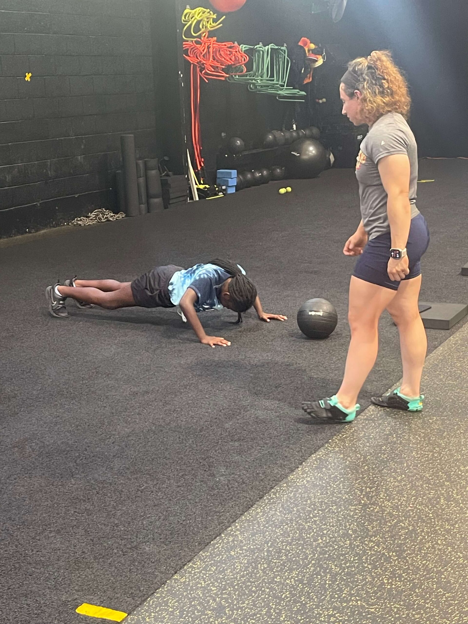 Dr Blake developing a strong foundation of a 10 yr old Dance/Cheer student